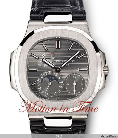 Patek Philippe NAUTILUS 5712G POWER RESERVE MOONPHASE WHITE GOLD SEALED watches