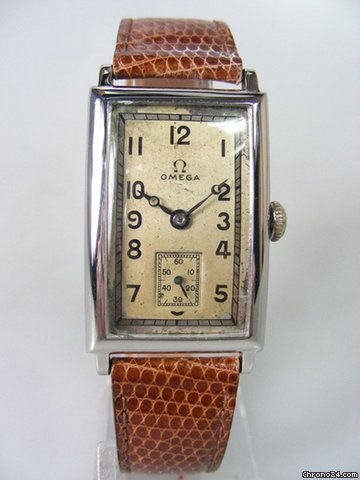 Omega Rectangulaire vintage annee 1930's galbee acier/cuir watches