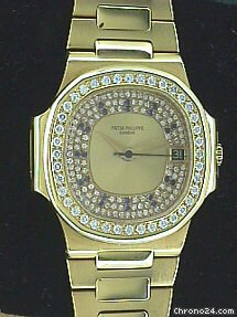 Patek Philippe Gent's 18K Yellow Gold Nautilus watches
