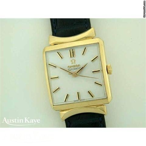 Replica Omega 18ct gold automatic on strap Watch