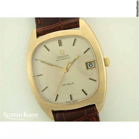 Omega De Ville 9ct gold automatic on strap watches