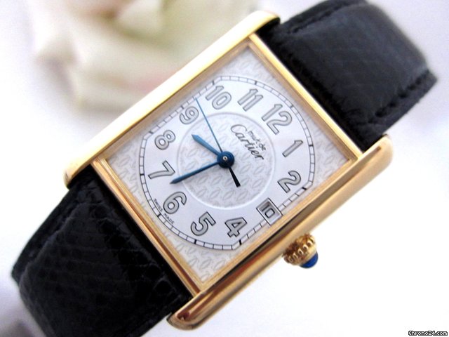 Cartier Tank XL mit Datum watches