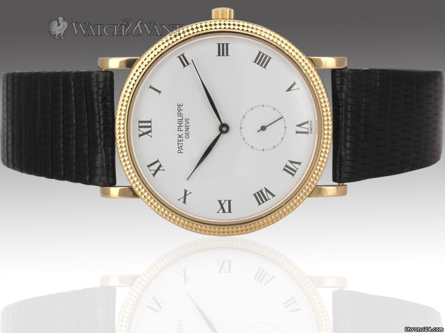 Replica Patek Philippe Mens Calatrava - Reference 3919 J - 33mm 18k Yellow Gold - Hobnail Textured Bezel - Discontinued Model Watch
