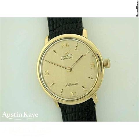Movado Sillhouette 18ct gold automatic on strap watches