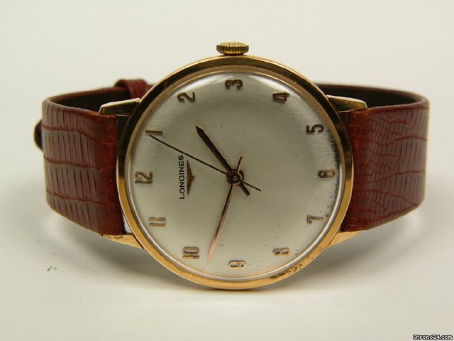 Longines yellow gold leather strap watches