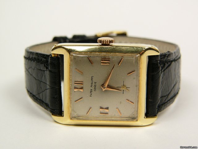 Patek Philippe rectangular yellow gold with leather strap watches