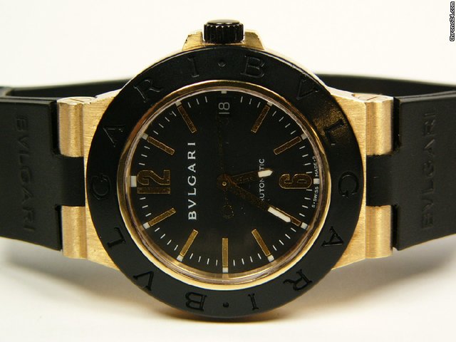 Bulgari Diagono yellow gold and rubber AL38G watches