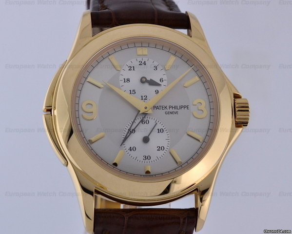 Patek Philippe Travel Time 18K Yellow Gold Manual 37MM watches