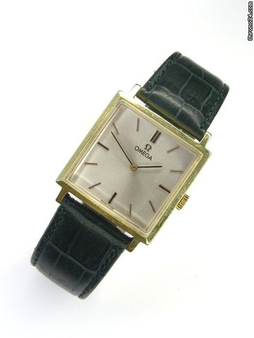 Omega Quadrant gold cap watches