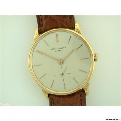 Patek Philippe Calatrava 18ct gold mnaual on strap watches