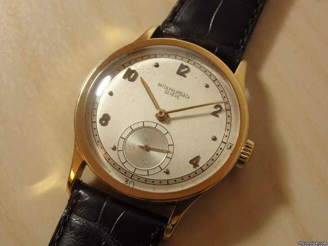 Patek Philippe ref 570 yellow gold with two tone dial. watches