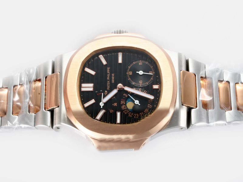Patek Philippe Nautilus 5712/1A Manual Winding Round Black Dial Watch watches