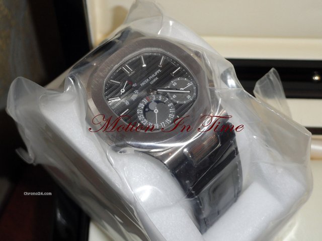 replica Patek Philippe NAUTILUS 5712G POWER RESERVE MOONPHASE WHITE GOLD SEALED WATCHES 1