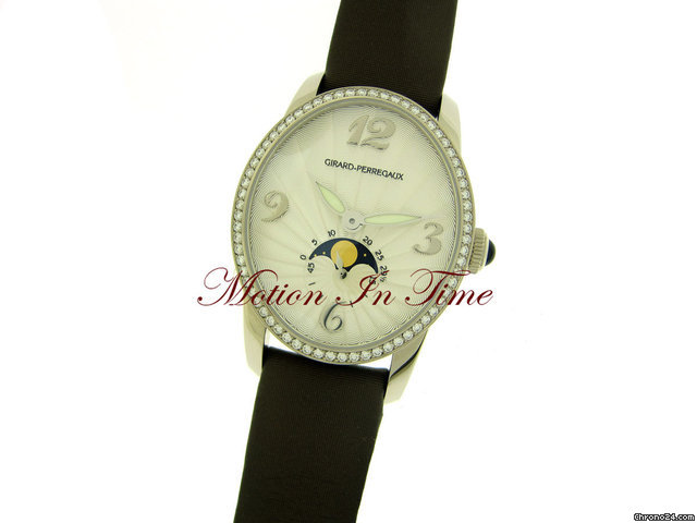 replica Girard Perregaux CAT'S EYE MOONPHASE LADIES' WHITE GOLD DIAMOND w/ SKELETON WATCHES 1