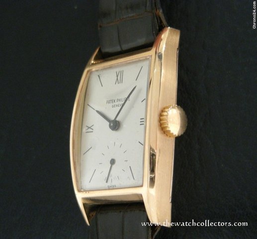 Patek Philippe Very Fine and Rare "Ref.2470" Pink gold tonneau from the 60 's with Extract of the Archives WATCHES 2