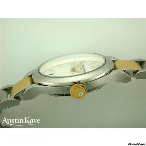 replica Baume & Mercier & bi-colour quartz on bracelet. WATCHES 1 