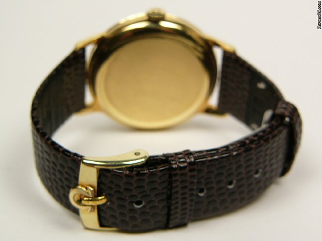 replica Omega automatic stainless steel and yellow gold Mod 49569273 WATCHES 1 